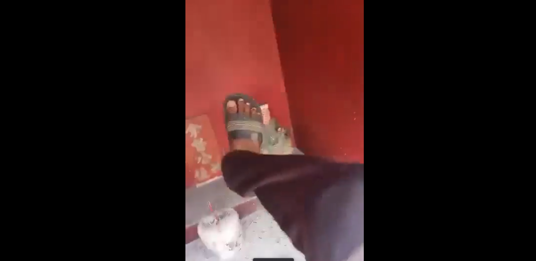 Image from: Man defiles Chinese shrine as revenge for 'Allah' socks