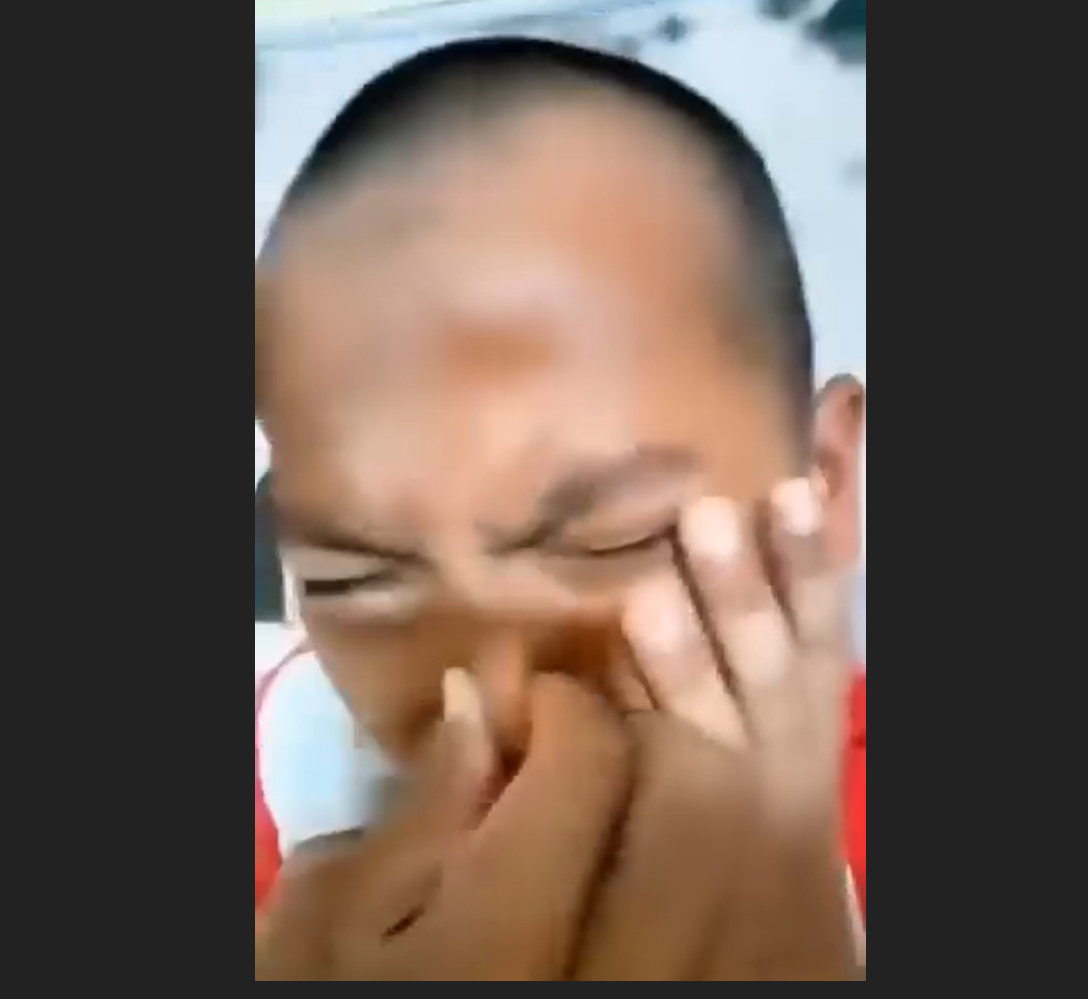 Image from: "Knee on chest, bruises on face" Viral video shows children being abused in GISBH charity homes