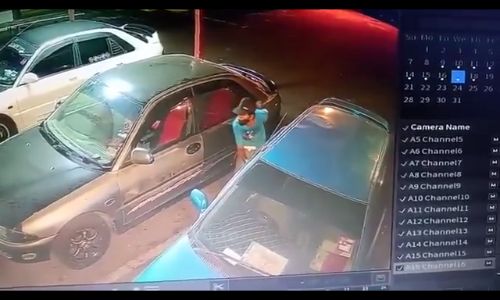 Thief caught on CCTV stealing goods from car in the middle of the night ...