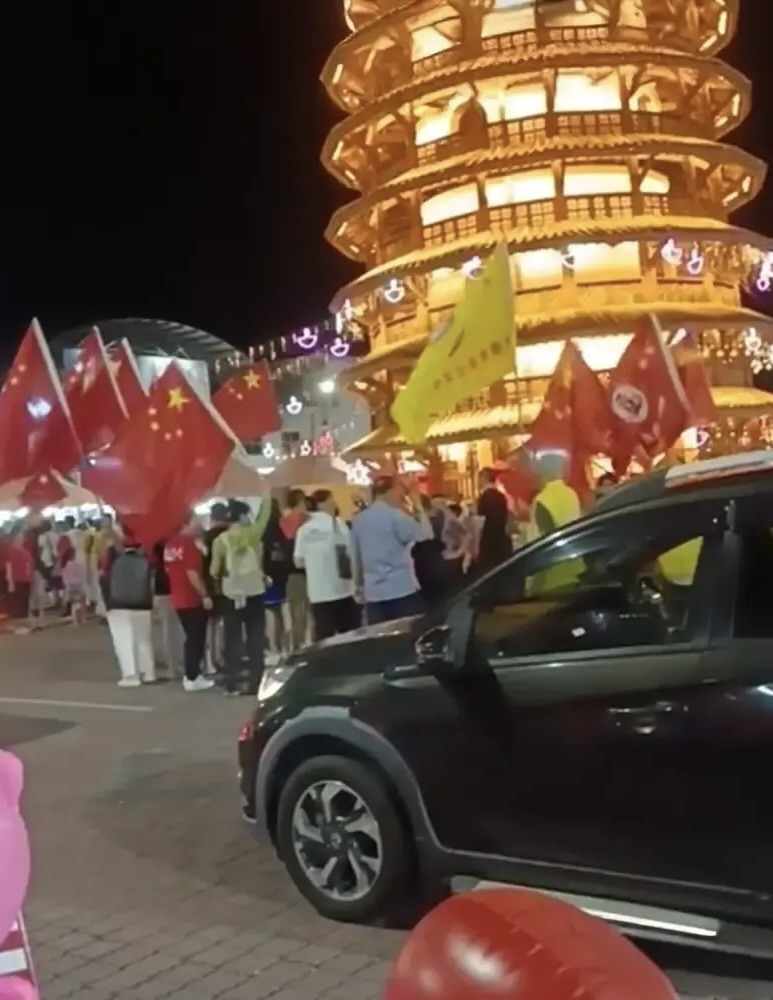 Image from: Organiser of controversial Teluk Intan event where participants waved the China flag may face up to 6 months in jail