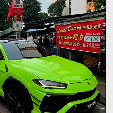 Image from: Gimmicky Election Campaign: Luxury Cars, Lion Dance, Bodyguards, And Chinese Style Baju In Tanjung Bungah