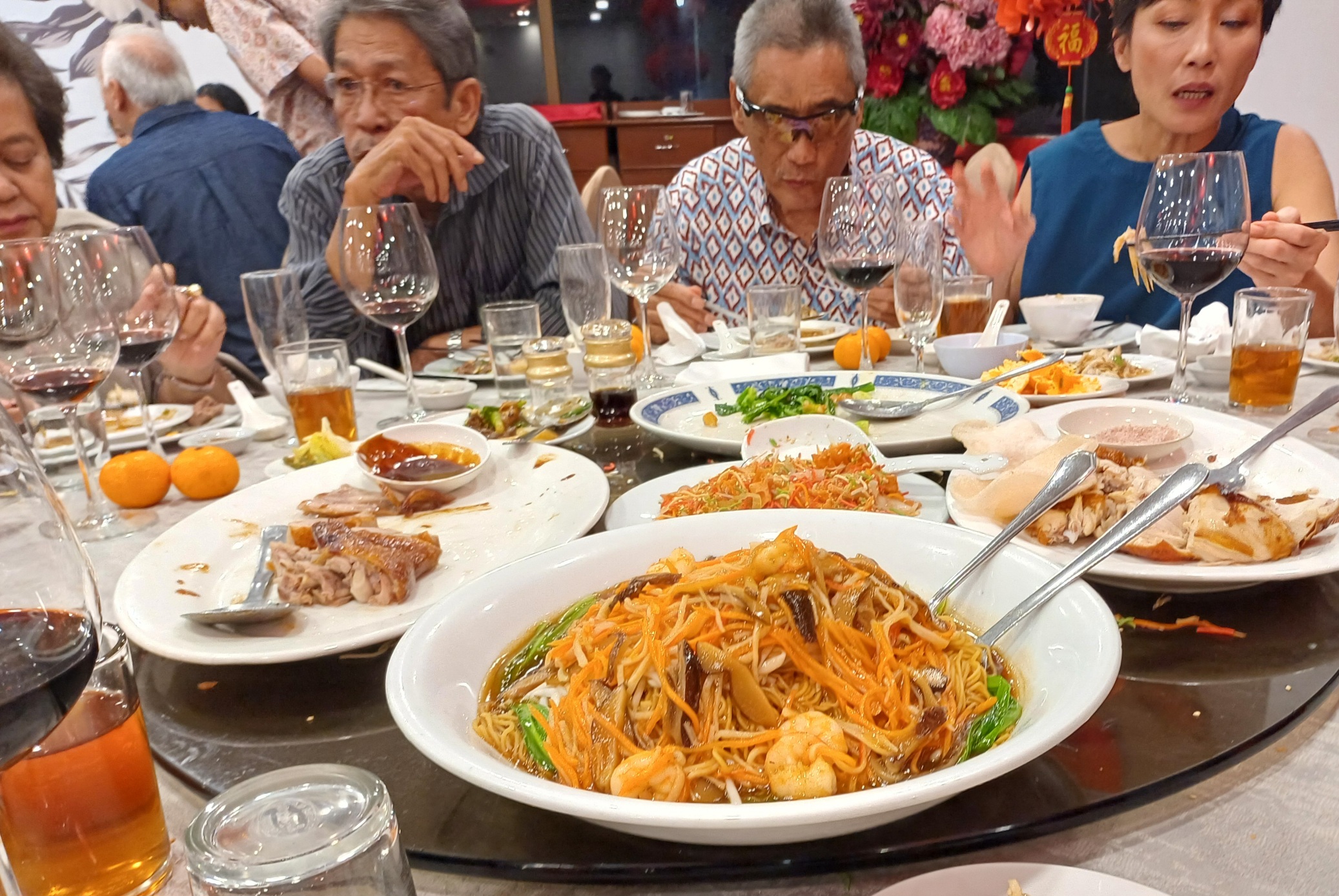 Image from: A Tapestry of Tradition: Yee Sang Unites a Multicultural Malaysian Family #CNY2024