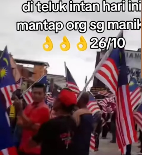 Image from: China flag-waving controversy at the International Guan Gong Cultural Festival in Teluk Intan