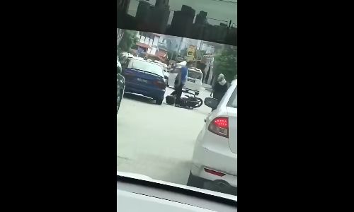Woman struck by a man during altercation in middle of road - update11111