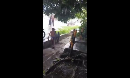Kid gets swept away by drain current while playing during heavy rain - update11111