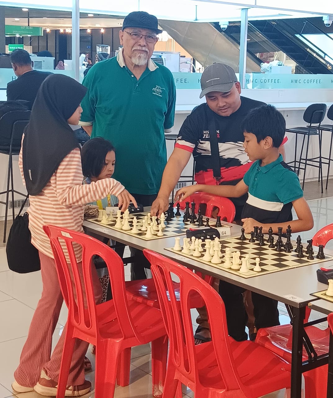 Image from: D'Pulze Youth Chess Championship Under 14 at Cyberjaya where the entire world at war reflected on the checkered boards