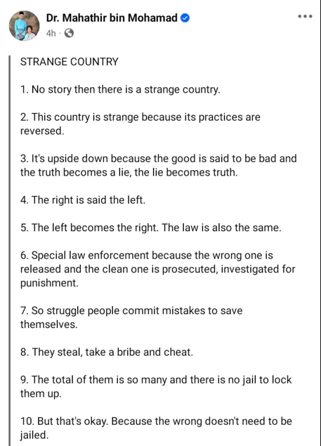 Image from: Upside Down Country - Mahathir Critiques Justice System saying "This Country is Strange as its Practices are Reversed"