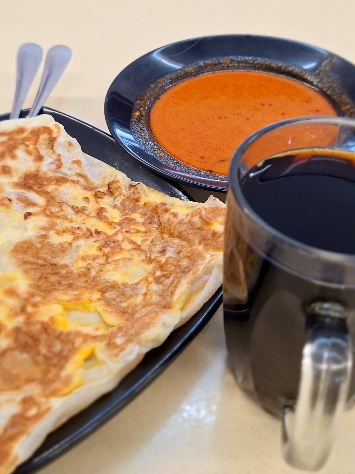 Image from: OPINION | If You Can't Say Roti Canai, Don't Claim You're Representing Malaysia