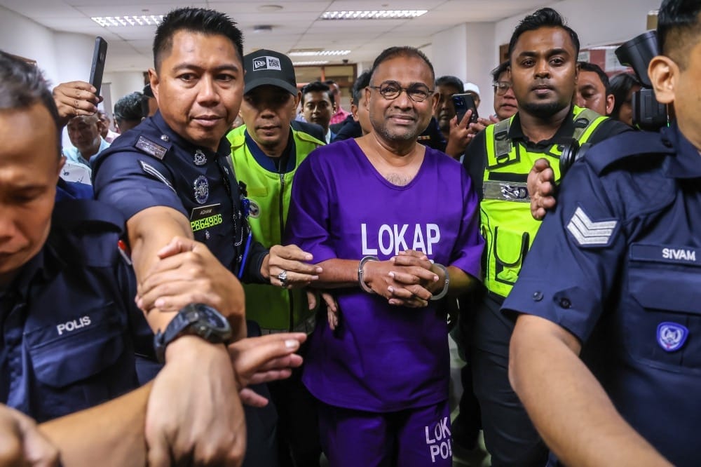 Image from: Why Do Some Suspects Wear Orange While Others Purple? Decoding the 8 Lockup & Prison Uniform Colours in Malaysia