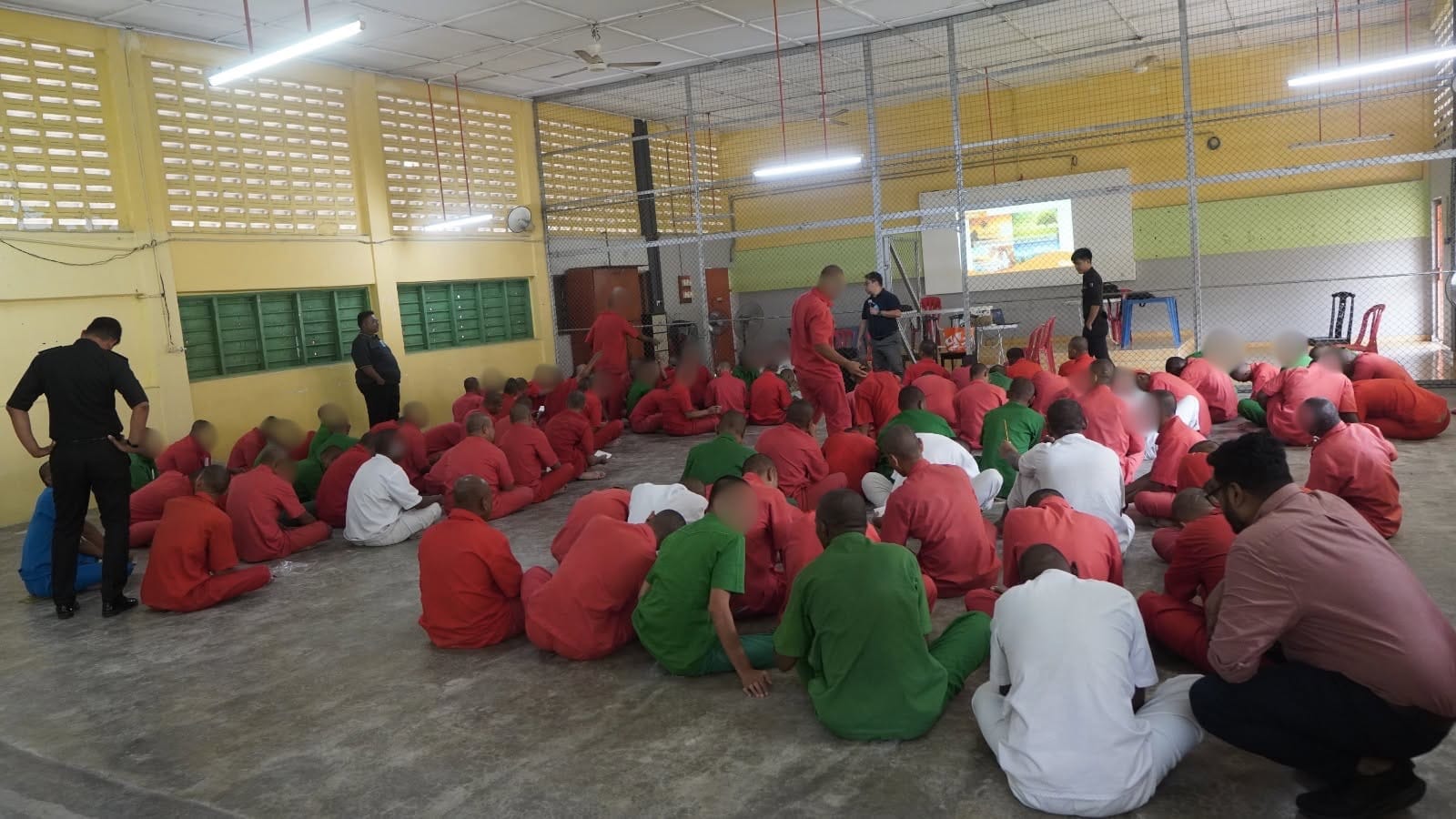 Image from: Why Do Some Suspects Wear Orange While Others Purple? Decoding the 8 Lockup & Prison Uniform Colours in Malaysia