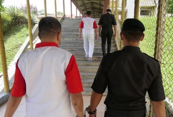 Image from: Why Do Some Suspects Wear Orange While Others Purple? Decoding the 8 Lockup & Prison Uniform Colours in Malaysia