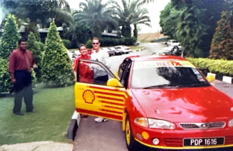 Image from: Part 2: The Proton Wira, Rally Battles, and the Day Michael Schumacher Took the Wheel