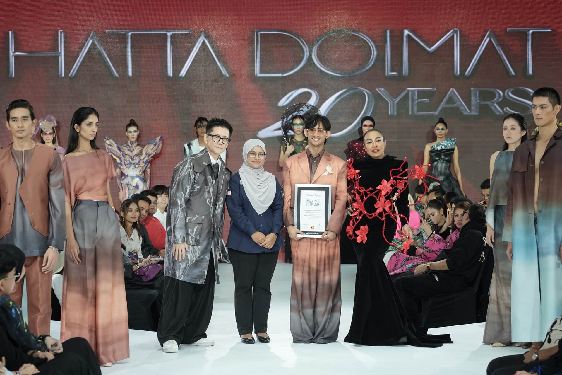 Image from: Hatta Dolmat’s KLFW 2026 Finale: 20 Years of Art, Memories and a Moment He Never Expected